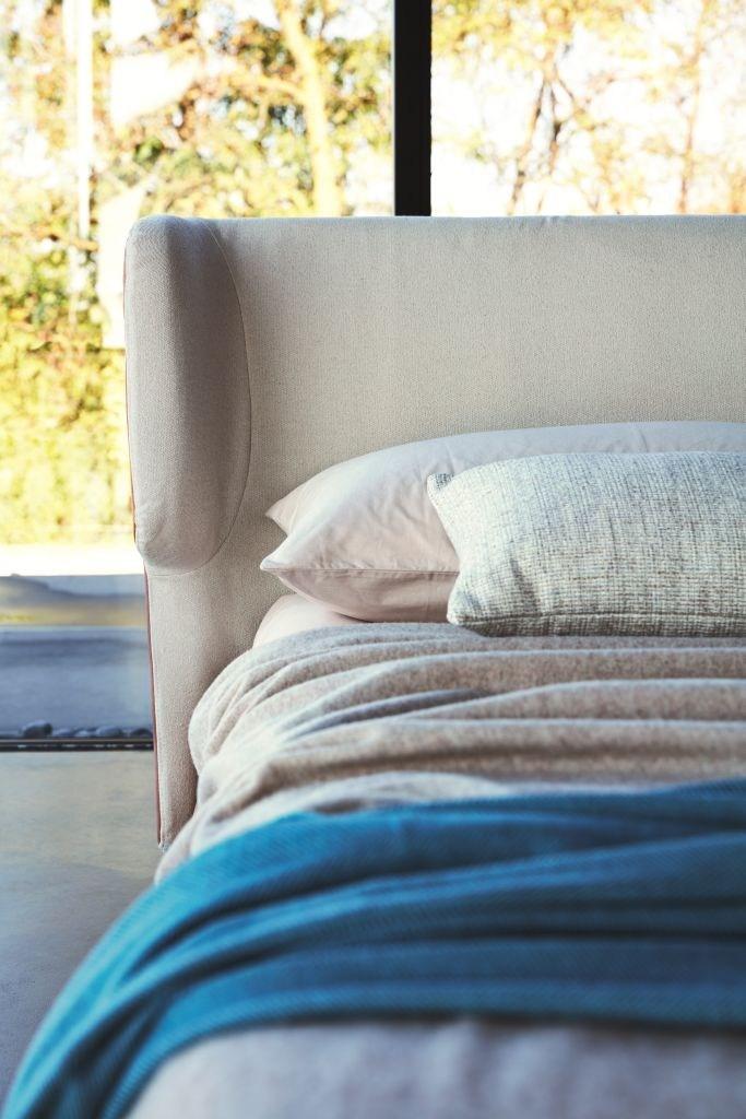 CLAIRE Leather storage bed with upholstered headboard