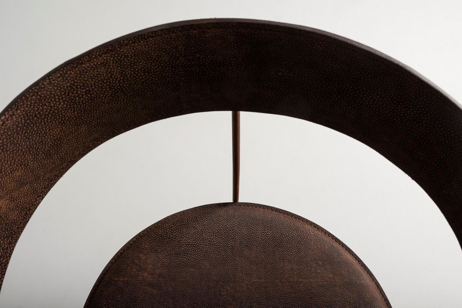 PARABOLICA Tanned leather and Corten™ chair with armrests