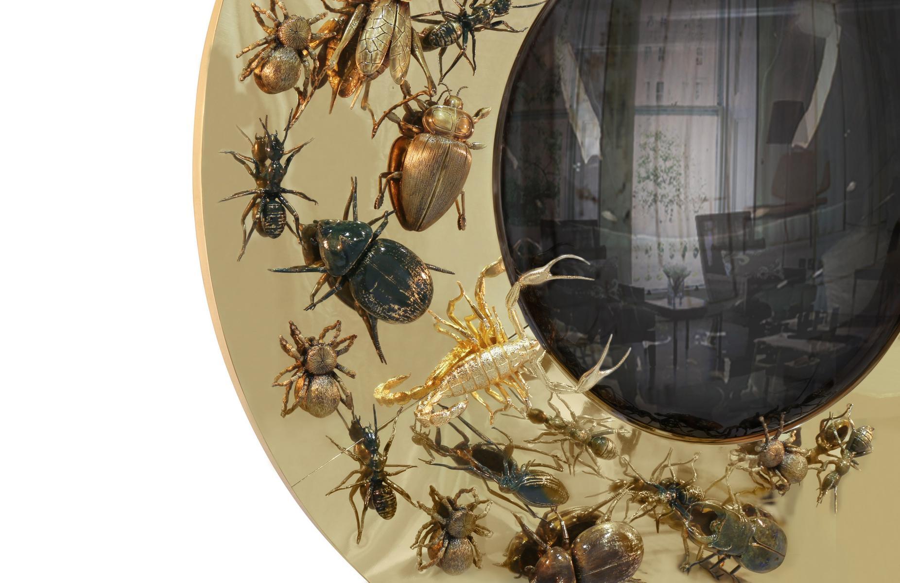 CONVEX METAMORPHOSIS Round wall-mounted framed brass mirror