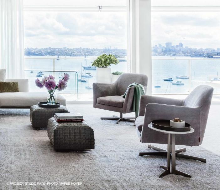 LUCE Swivel fabric armchair with armrests