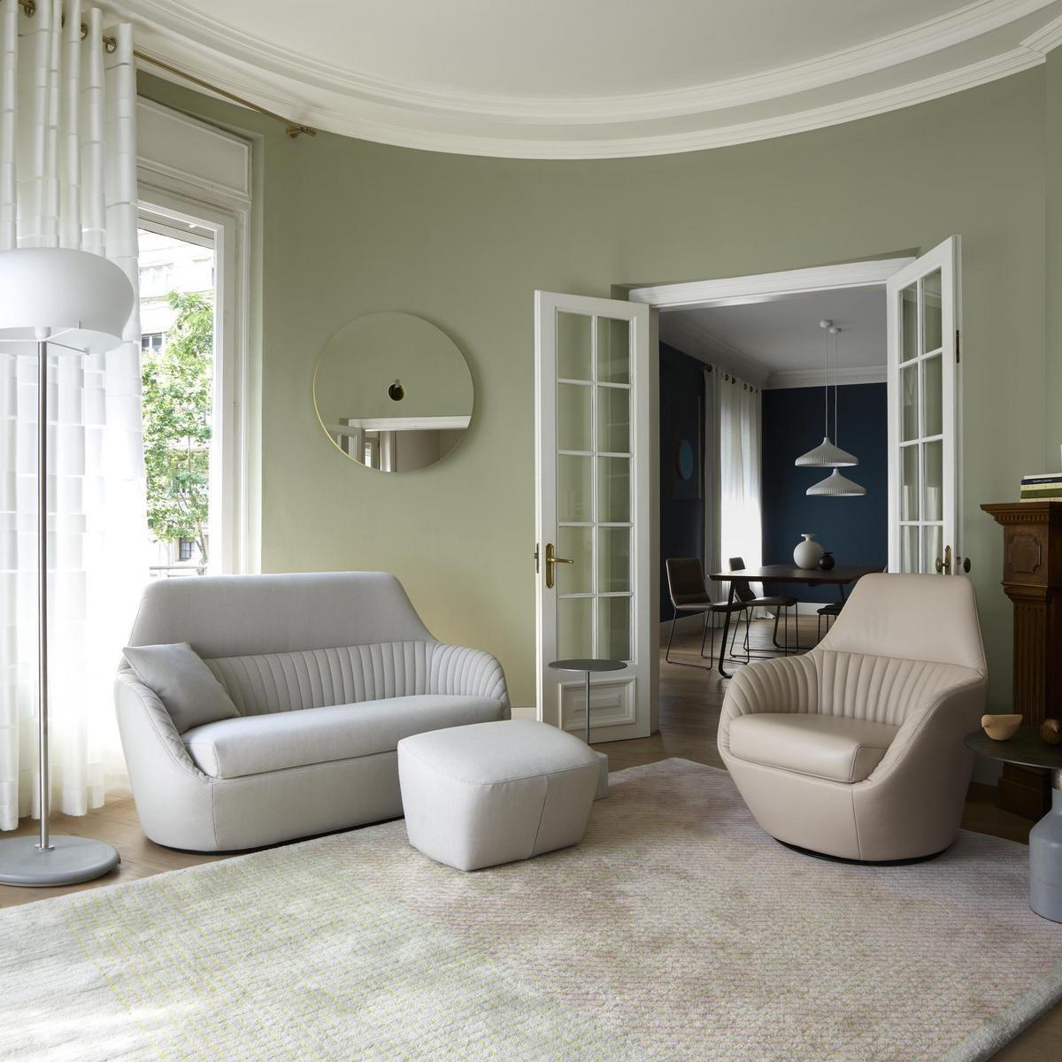 AMÉDÉE Swivel upholstered fabric armchair with armrests