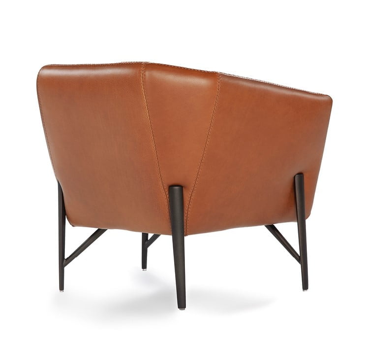 VENERE Contemporary armchair with a slim, enveloping structure and soft cushion for comfort, ideal for space efficiency without compromising on style.