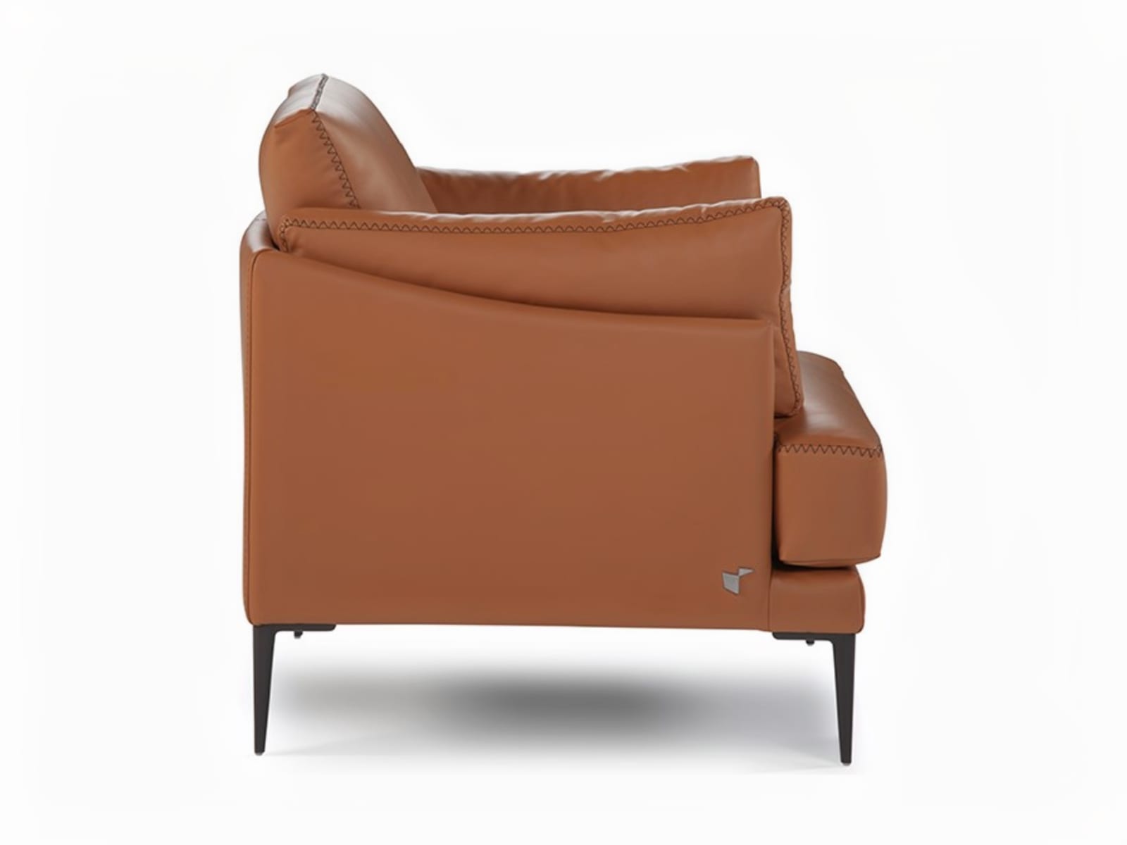 FLEUR Elegant Fleur chair with stylish pin-shaped legs and sophisticated stitches, ideal for both snug homes and professional spaces, offering comfort in compact form with option for leather or removable fabric.