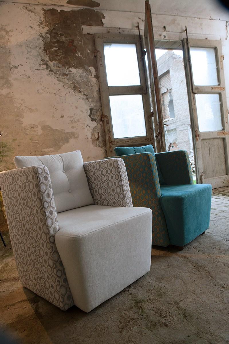 ARTIBELLA Upholstered fabric armchair with armrests