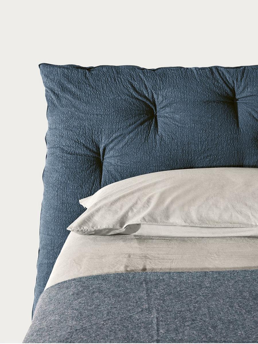 IMPUNTO Upholstered fabric double bed with tufted headboard
