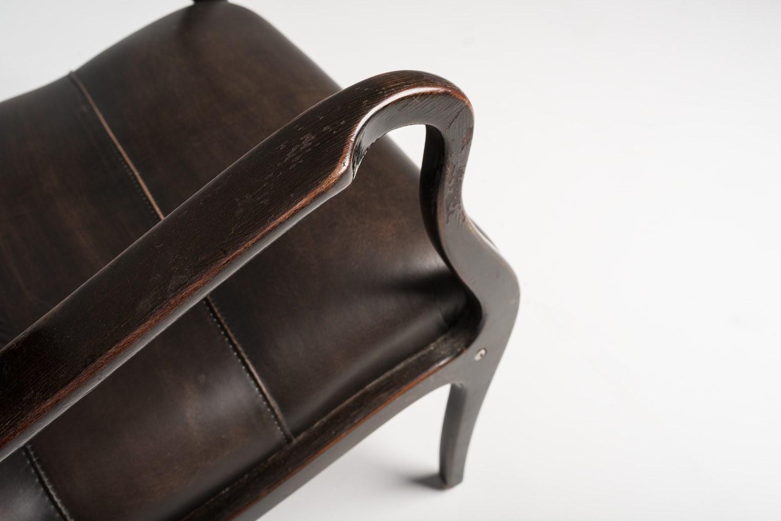 ESSE Beech and leather armchair with armrests