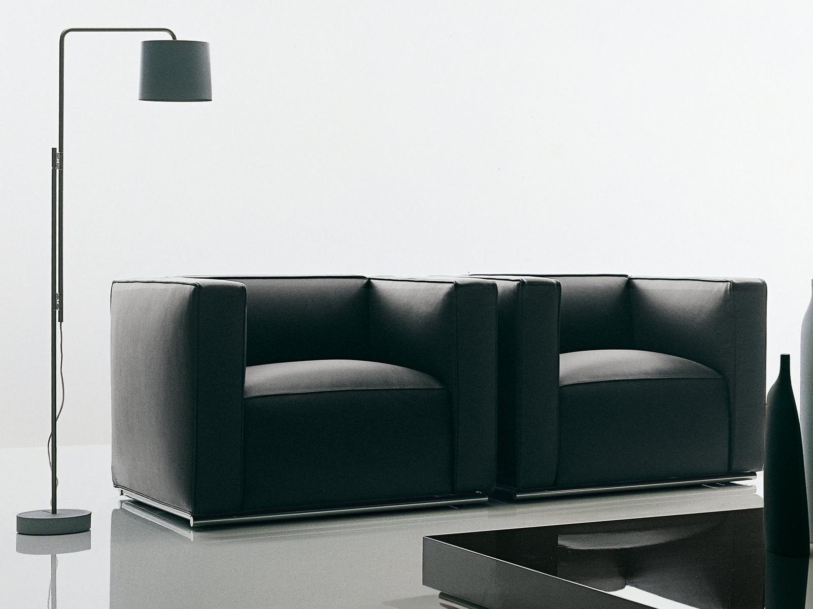 SHANGAI Upholstered leather armchair with armrests