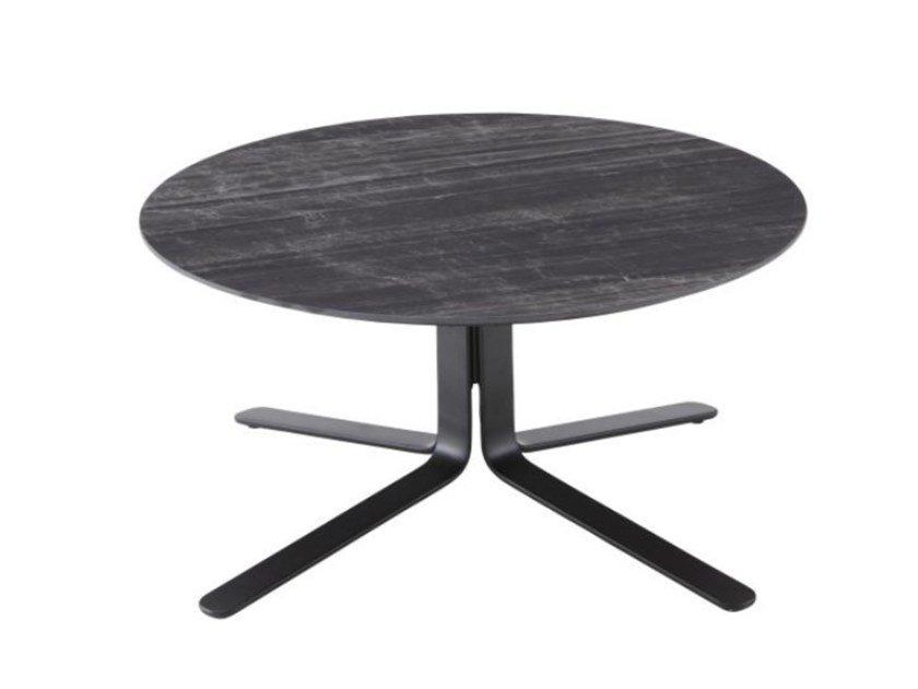 MOA Low round porcelain stoneware coffee table with 4-star base