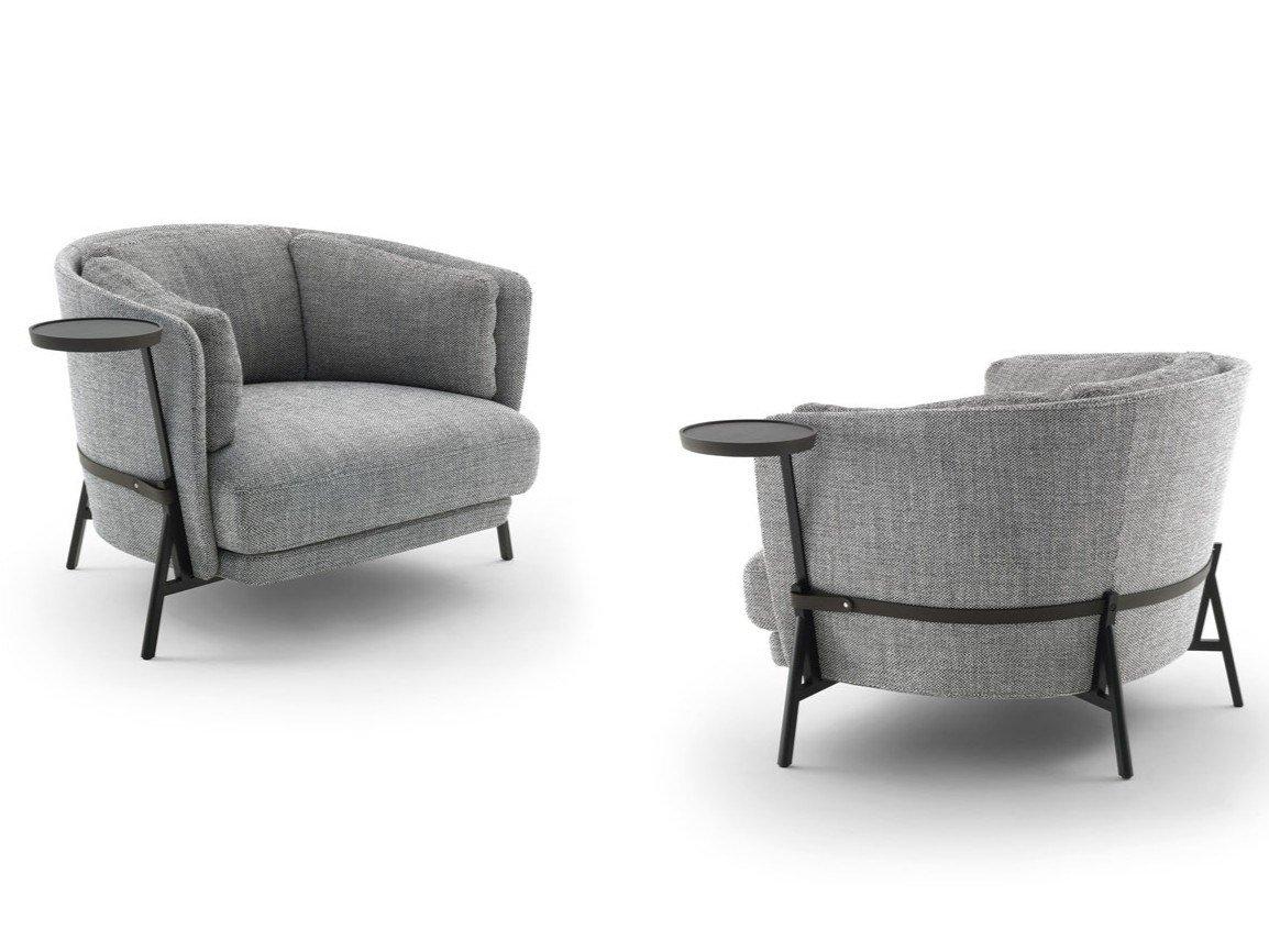 CRADLE Fabric armchair with armrests with integrated magazine rack