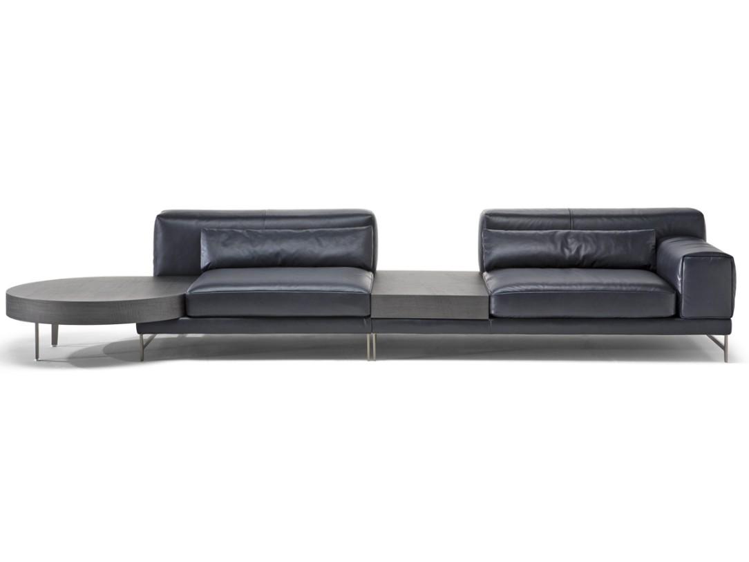 IDO Leather sofa with integrated magazine rack