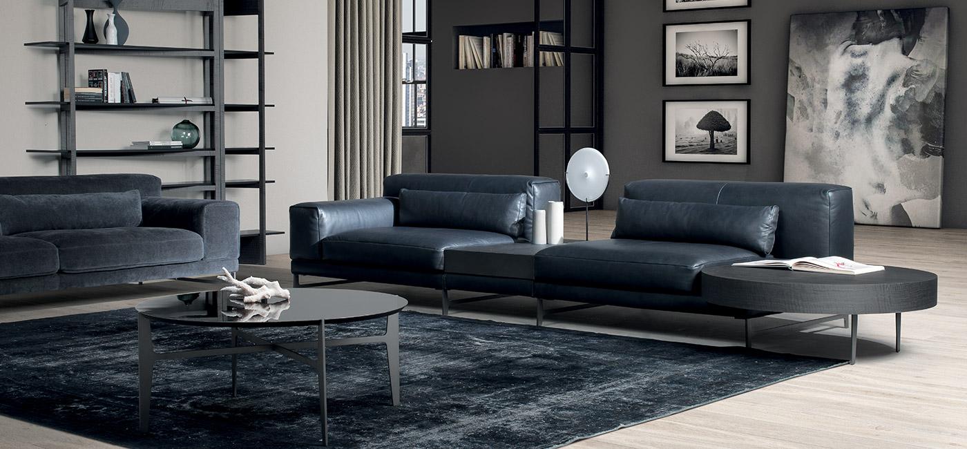 IDO Leather sofa with integrated magazine rack