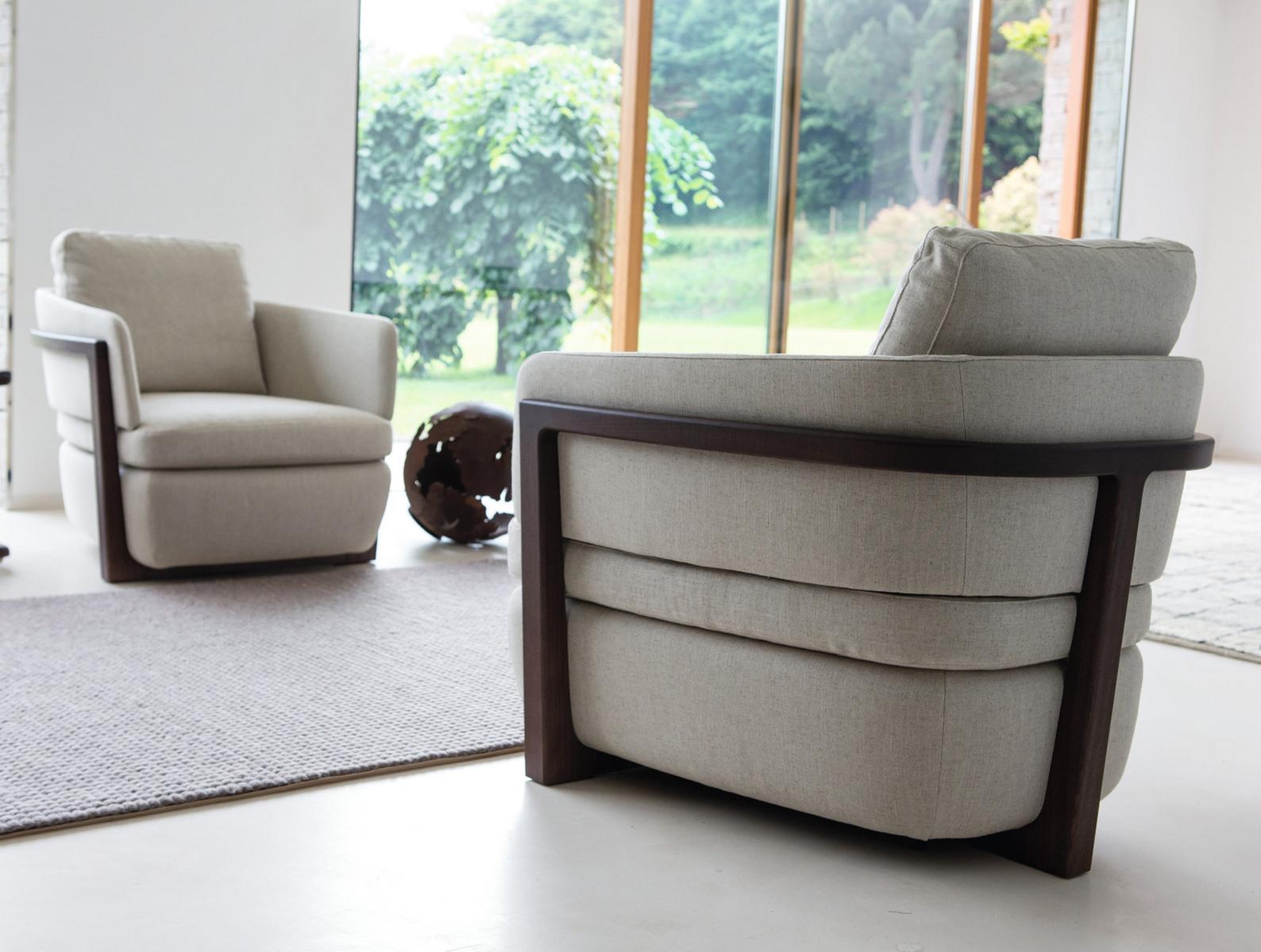 ARENA Upholstered fabric armchair with armrests