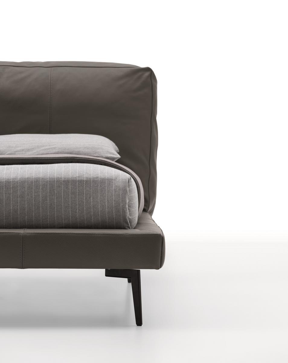 SOUND Leather bed with upholstered headboard
