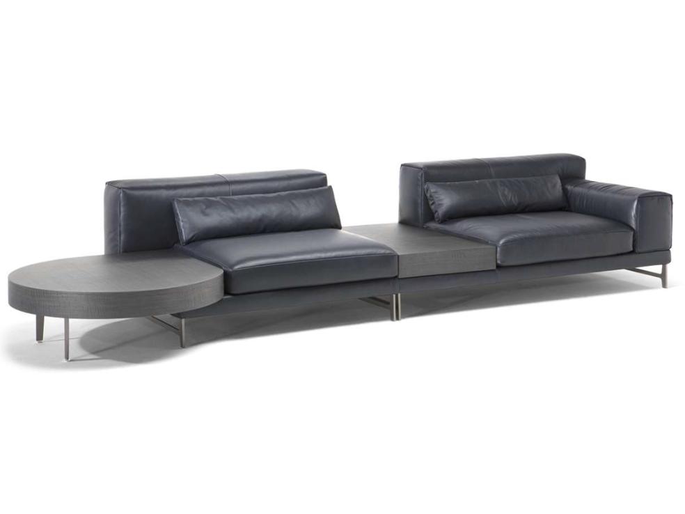 IDO Leather sofa with integrated magazine rack