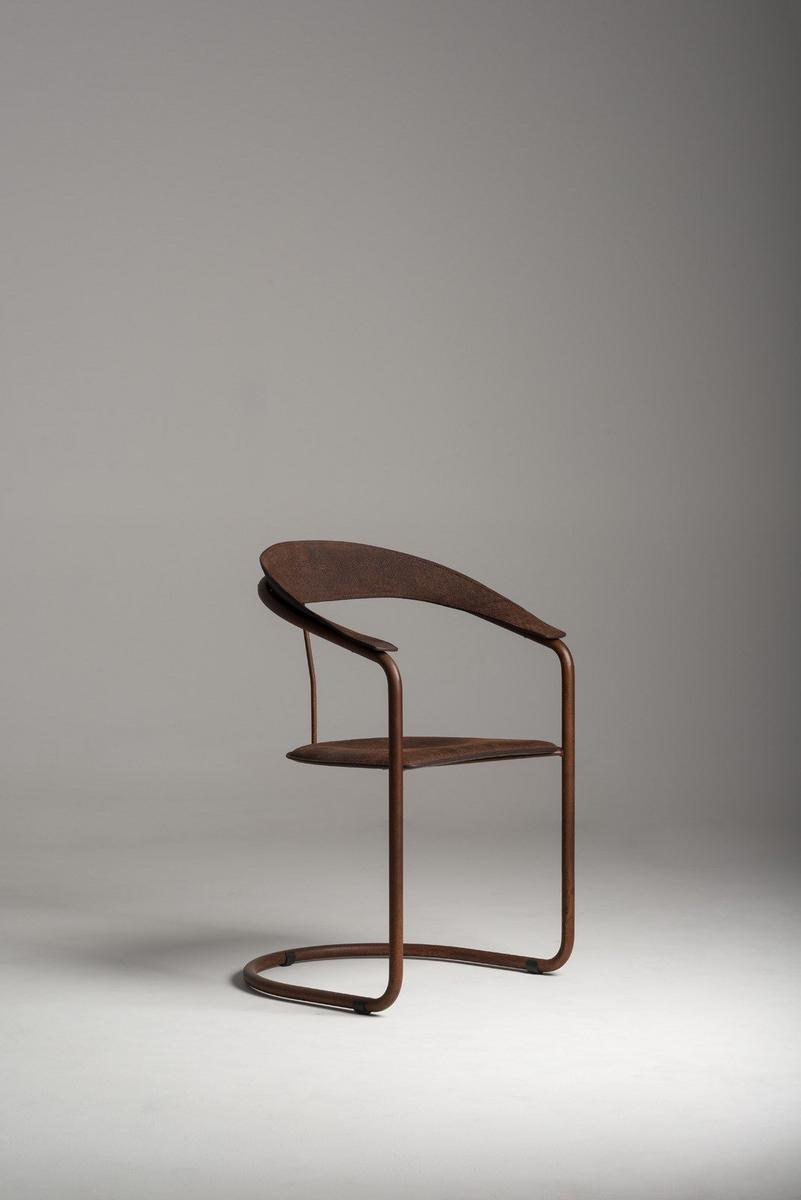 PARABOLICA Tanned leather and Corten™ chair with armrests