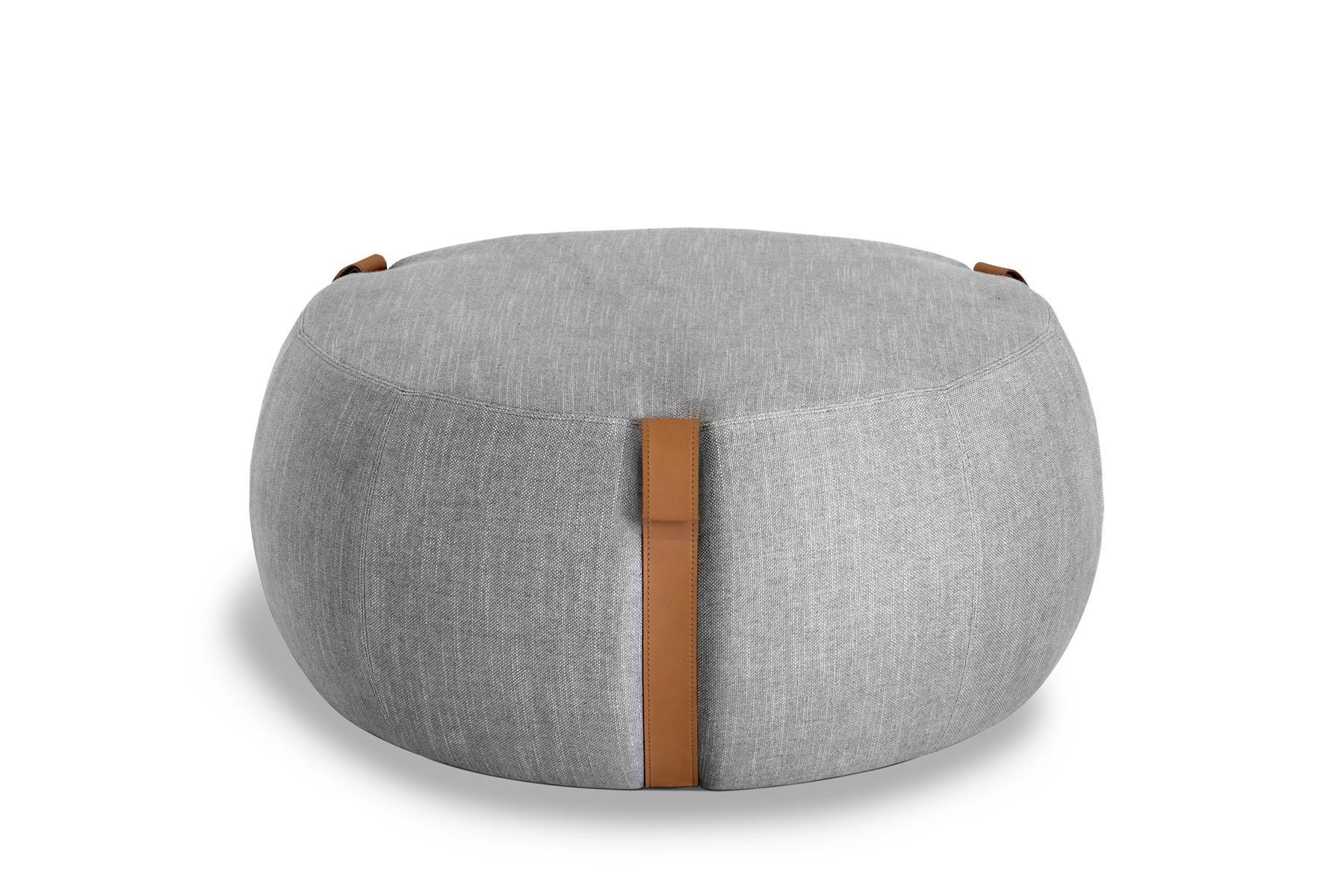 NOTCH Upholstered fabric pouf