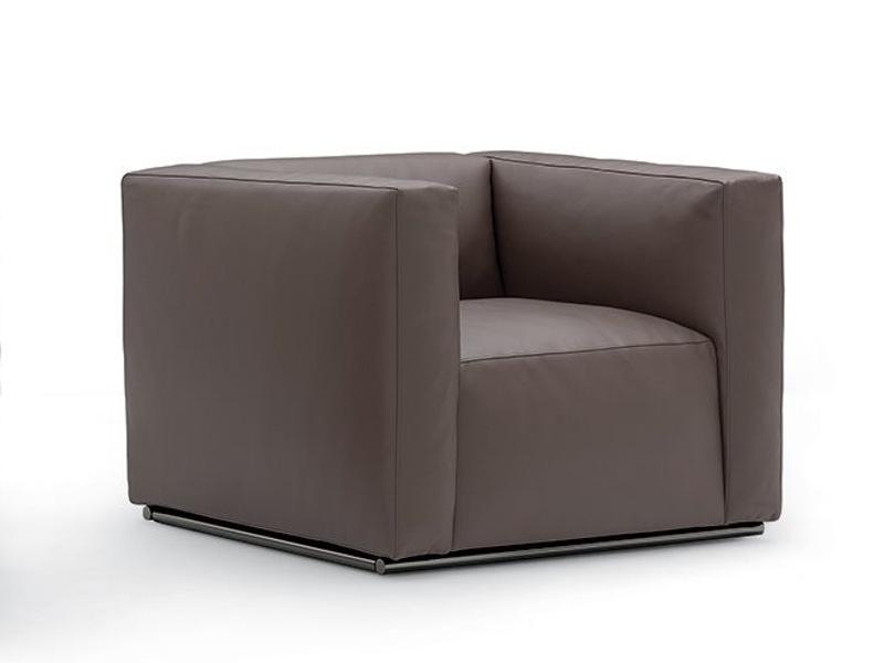 SHANGAI Upholstered leather armchair with armrests