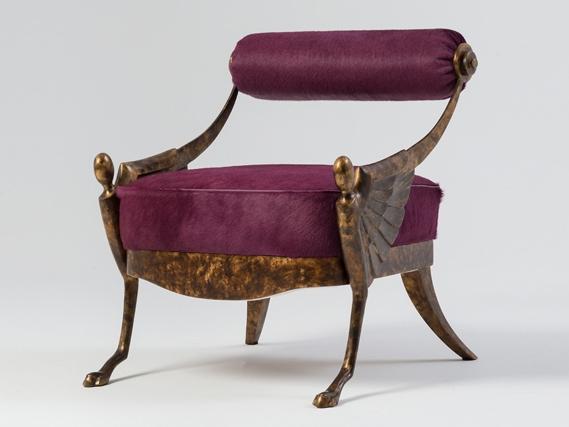 OVER Leather and bronze easy chair