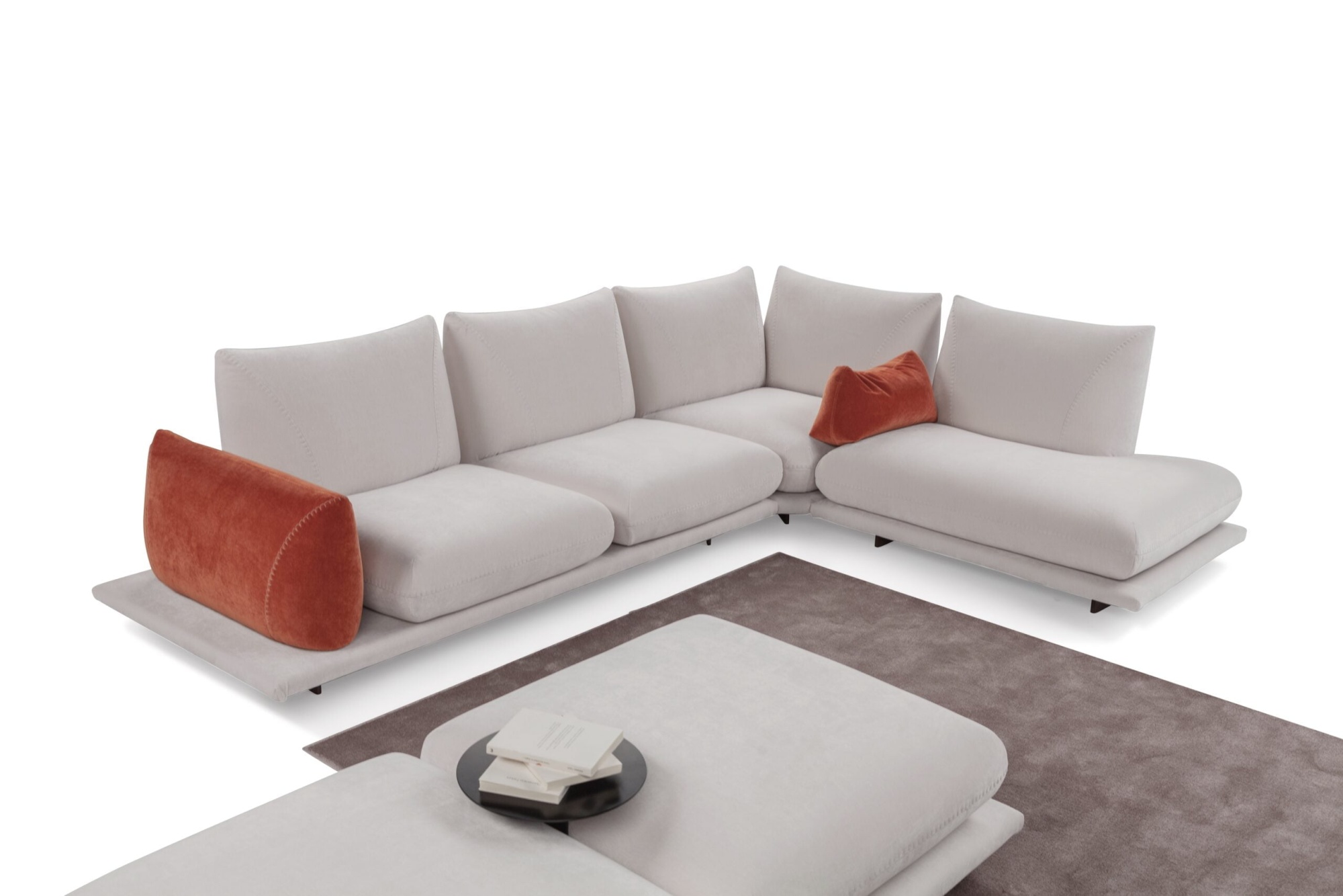 PRALIN Modular 'Pralin' sofa with removable elements, wooden feet, and versatile configurations, including a day bed and integrated table, ensures customizable comfort and relaxation.
